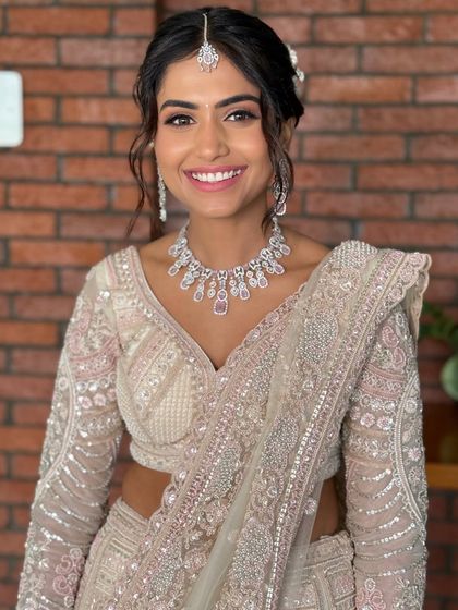 A beautiful smile from my stunning reception bride. The makeup is soft and glamorous, perfect for a night of celebration.