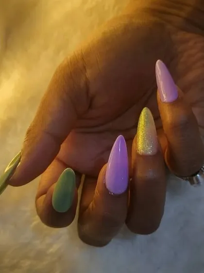 A different angle of the soft gel extensions in pastel tones, showing the pretty combination of colors.