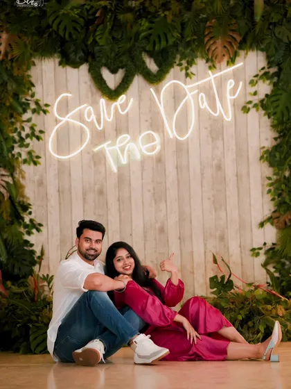 Announce your big day in style! We provide creative props and setups like this "Save The Date" neon sign for memorable pre-wedding announcements.