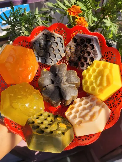 A colorful assortment of my various facial soaps in a basket. You can see different types like coffee, ubtan, and honey based soaps, each with its unique benefits for glowing skin.
