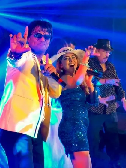 Rocking the stage with my team in Bali. We bring a complete entertainment package with multiple singers and performers to keep the party going for hours.