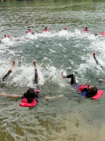A fun, synchronized swimming activity in the river at Dandeli, another example of our team-building exercises.