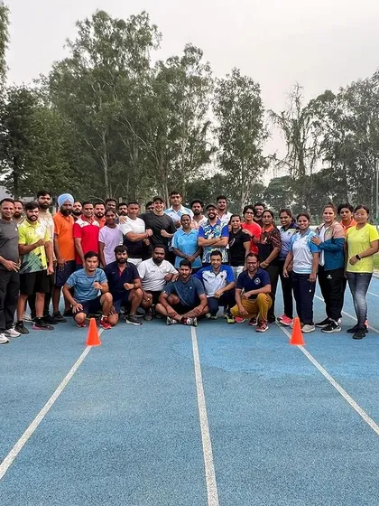 A great group of coaches on the track after a practical session.