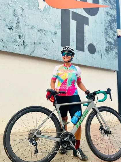 Our custom cycling apparel is designed to stand out, just like our riders. Here's our vibrant 2023 Summer edition jersey, a perfect blend of performance and style, seen against a motivational backdrop that captures our 'Just Ride' spirit.