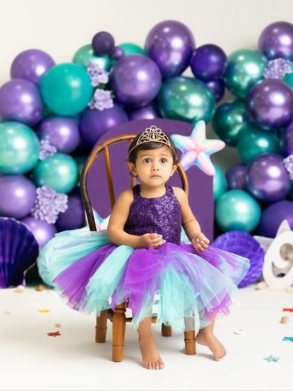 A first birthday fit for a mermaid princess. The combination of a beautiful balloon arch and an under-the-sea theme creates a truly memorable and photogenic celebration.