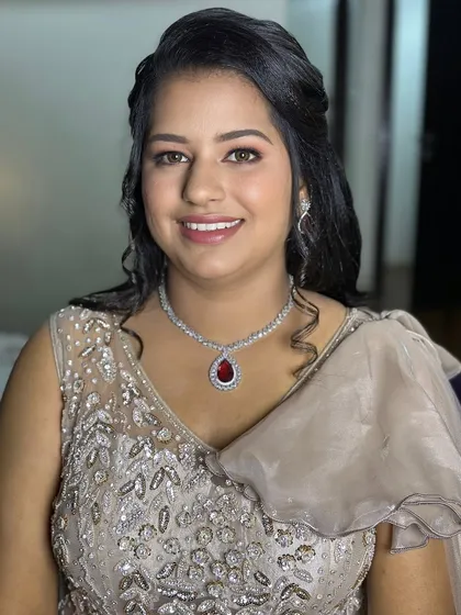 A happy and confident bride-to-be, ready for her engagement ceremony.