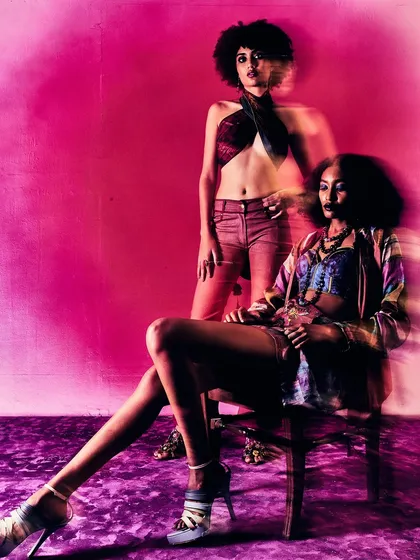 An artistic, motion-blur shot from the Unity Loom campaign, capturing the dynamic and creative spirit of the collection.