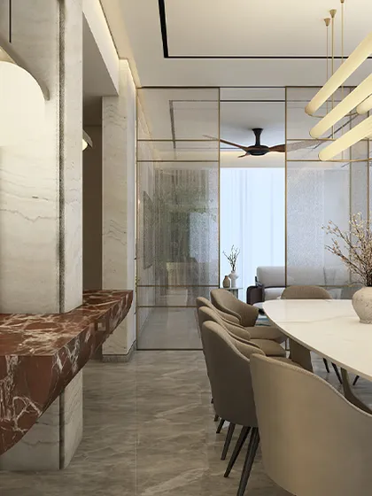 Another view of the sky-high dining room, where patterns and materials blend seamlessly. The interplay of different marbles, from the floor to the walls to the bar, grounds the space, while minimal ceiling detailing casts a warm, diffused glow.