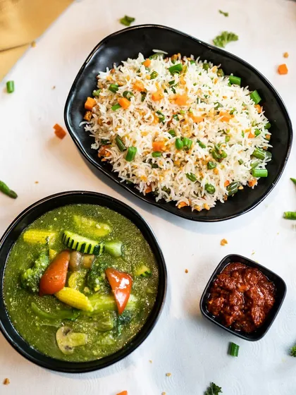 Skip the ordinary and try our extraordinary Burnt Garlic Rice with Vegetables in Green Garlic Sauce. It's a vibrant and flavorful combination.