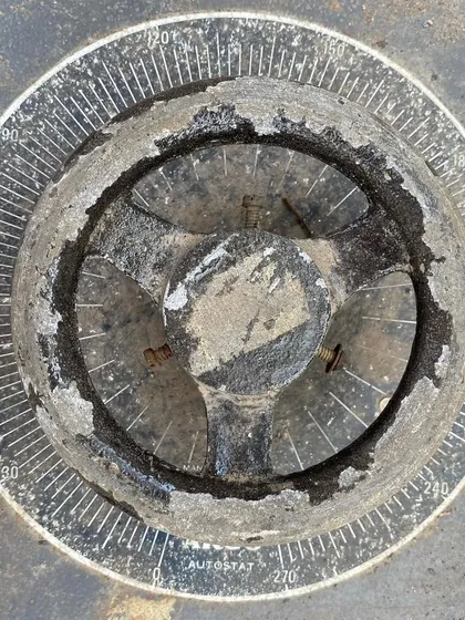 The dial of an old autostat transformer, used for precise, butter-smooth dimming. Learning on this type of analog equipment helps build an intuitive feel for light control that modern digital interfaces cannot replicate.