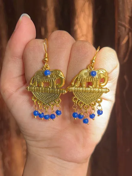 A collection of my simple, budget-friendly daily wear earrings in various blue and gold designs, perfect for college or office wear.