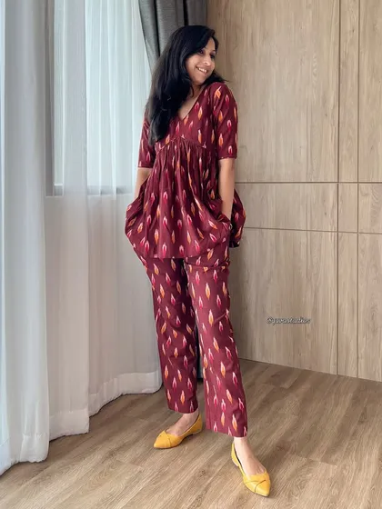 Our bestselling handloom Ikat co-ord set, shown here in a beautiful maroon. This piece is so loved that it gets restocked often, perfect for its blend of comfort and traditional charm.