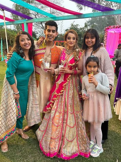 A picture with the happy couple and their family. These are the moments we cherish.