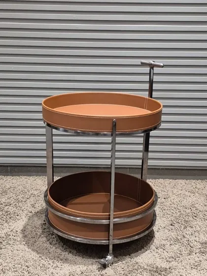 The same serving trolley design is also available in a classic tan and chrome combination.