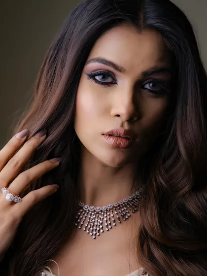 A close-up shot that captures the intensity and artistry of the eye makeup.