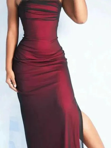 A close-up of the maroon gown, showing the subtle ruching on the bodice and the delicate sheer overlay.
