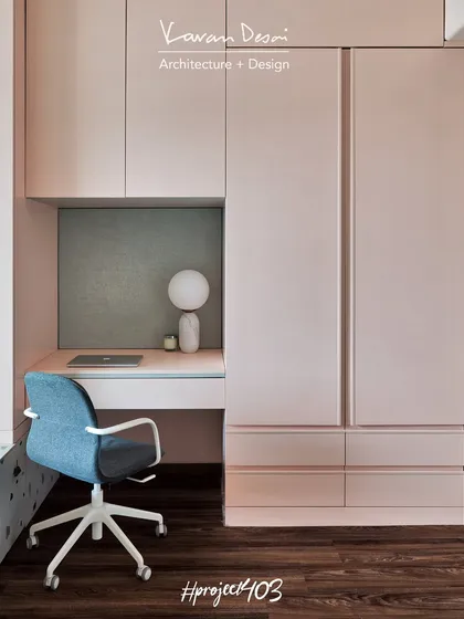 We integrated a compact study area into the kids' room for the Red Fort Project. The desk and shelving are built into the wall unit, providing a dedicated space for homework without cluttering the room.
