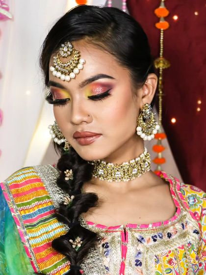 Another angle of this colorful Haldi makeup look. The bold eyeshadow is balanced with a neutral lip, letting the eyes be the star of the show.