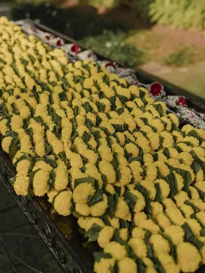A tray of fresh floral garlands ready for the "Baraat Swaagat" (welcoming the groom's procession). This is a beautiful and essential part of a traditional Indian wedding welcome.