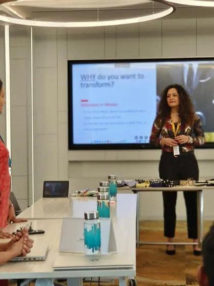 Interacting with a participant during a workshop. One-on-one engagement is a key part of my training style, as it allows for personalized advice and a deeper connection.