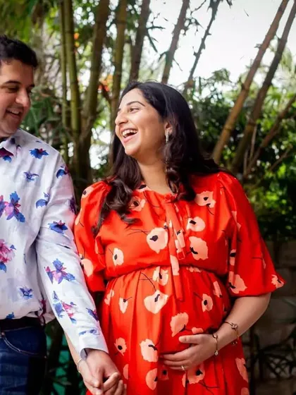 The journey to parenthood is filled with so much laughter and happiness. I love capturing these candid, joyful interactions between couples during their outdoor pregnancy photoshoot. Their smiles say everything!