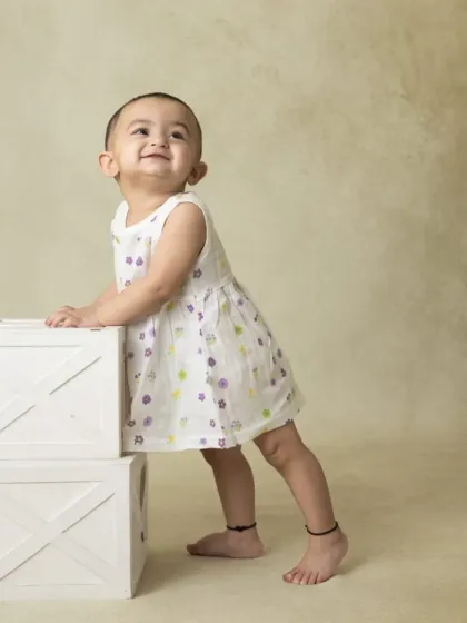 A collection of simple, classic portraits of twin babies. Without props or themes, their individual expressions and connection are beautifully highlighted.