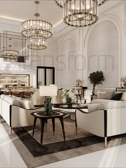 This modern classic living room is an expanse of luxury. I used grand chandeliers, stone cladding, and exquisite upholstery to create a space that whispers sophistication in every detail, from the arched walls to the curated furniture.