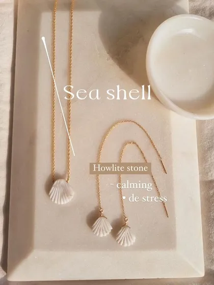 Inspired by the sea, this is my Howlite shell collection. The set includes a delicate shell pendant necklace and matching 'Sui Dhaga' threader earrings, both designed to bring a sense of calm and de-stress the soul.