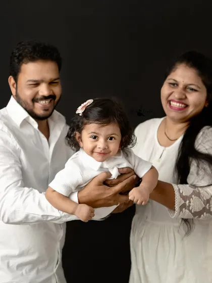 Pure happiness in my Navi Mumbai studio. The simple black backdrop makes your family's smiles and laughter the true masterpiece. These are the timeless portraits you will cherish forever.