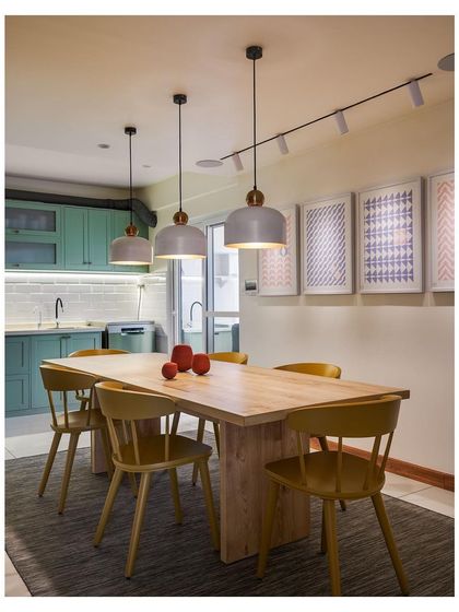 This dining area features our bespoke solid wood dining table, paired with classic chairs. The design emphasizes clean lines and natural materials, creating a functional and inviting space for daily life.