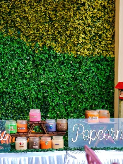 A classic party food station with candy floss and popcorn machines, a must-have treat that kids and adults both love.
