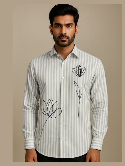 A full medium shot of the striped floral shirt, presented in a framed format for a polished lookbook feel.