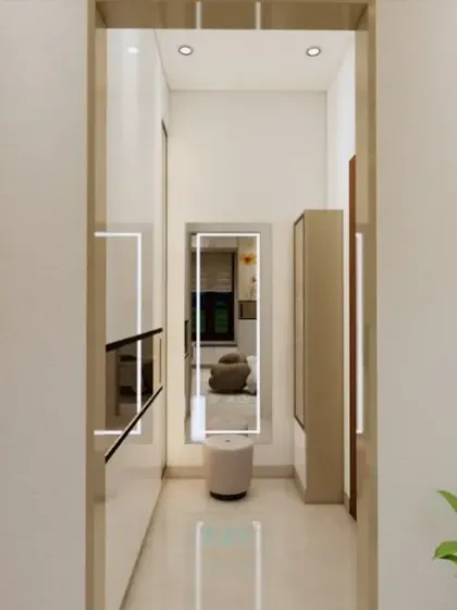 A view down a hallway, showing how we can integrate slim, full-height wardrobes to maximize storage in narrow spaces.