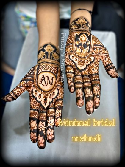 A minimal bridal design that is both elegant and modern. The custom initials and lotus motifs make it special without being overwhelming.