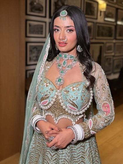 The complete bridal look, showcasing how the makeup, hair, and outfit come together. My goal is to create a cohesive and elegant style for your big day.