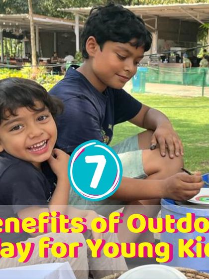 Two brothers enjoying an outdoor activity. Outdoor play is a fantastic way for siblings and friends to bond and create together.