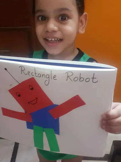 I love seeing the proud smile on a child's face after they complete a project. We made this 'Rectangle Robot' to learn about shapes in a creative way, showing how everyday objects are made of simple geometric forms. This is a key part of our general knowledge curriculum.