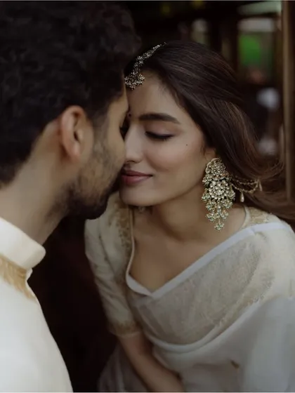 An intimate moment from a pre-wedding shoot. I help create a relaxed atmosphere where you can just be yourselves, resulting in elegant and romantic portraits that feel completely natural, like this beautiful close-up.