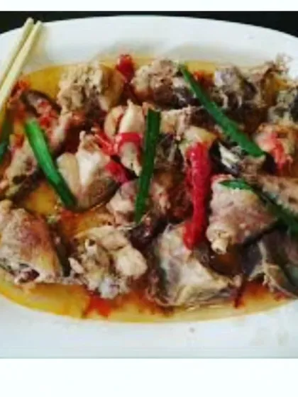 This is a Naga style chicken stew, cooked with bamboo shoots and fiery red chillies. It's a light yet flavourful curry that is incredibly comforting.