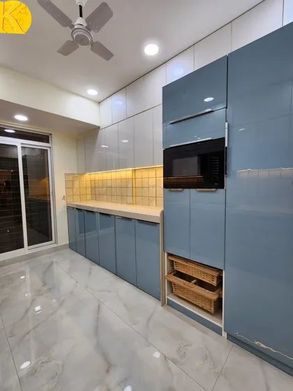 This image shows the full height of the tall unit, providing a glimpse of the extensive storage capacity we can build into our kitchen designs.