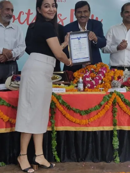 A proud moment accepting the Swasthya Ratan Award. This recognition fuels my commitment to promoting health and wellness.