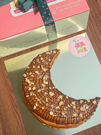 For Eid, I shape my Nutella hazelnut pull-apart bread into a crescent moon. It's a festive and delicious way to celebrate.