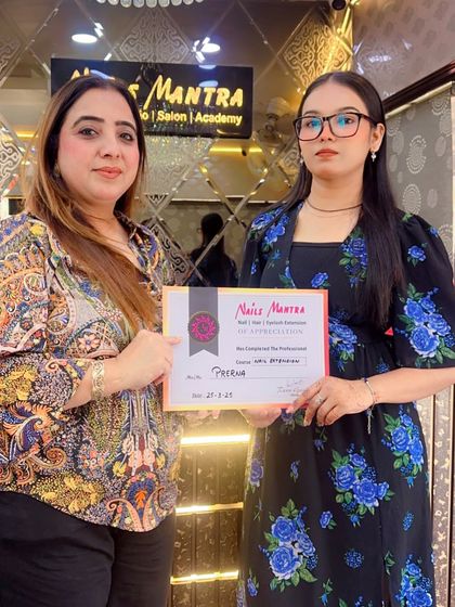 Another happy student, Prerna, receives her professional certification from our founder. We celebrate the success of every student who completes their journey with us.