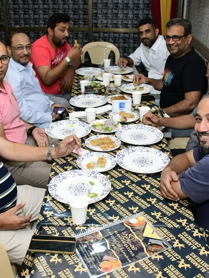A group of friends enjoying their dinner in our AC hall.