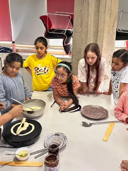 A hands-on crêpe workshop during our summer camp. Learning about French culture is always delicious and fun for our young students.