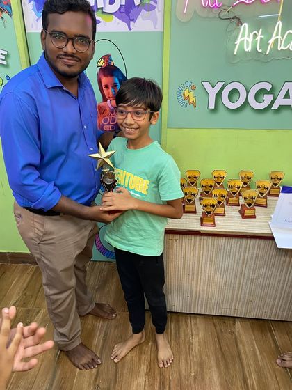 Areev Phatak, our 4th place winner, with his trophy. His strategic skills were impressive throughout the tournament.