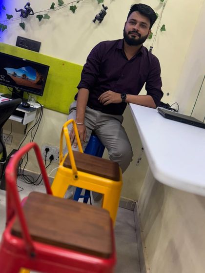 A casual moment in the office. I believe that to charge a premium, your brand must stand out. I help businesses build a strong financial foundation that supports a premium brand identity.