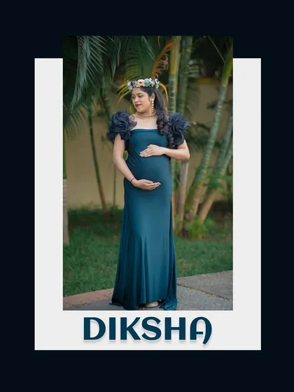 A simple, elegant portrait focusing on the mom-to-be. The dark background and central framing make this a powerful and timeless image.