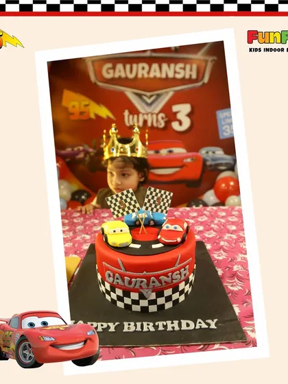A close-up of the amazing Cars birthday cake. The details, from the checkered pattern to the Lightning McQueen topper, show how I coordinate every element of the party.