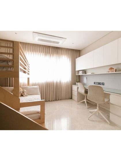 The overall view of the boys' room, showing how the bunk bed, study area, and storage are integrated into a cohesive and functional space.